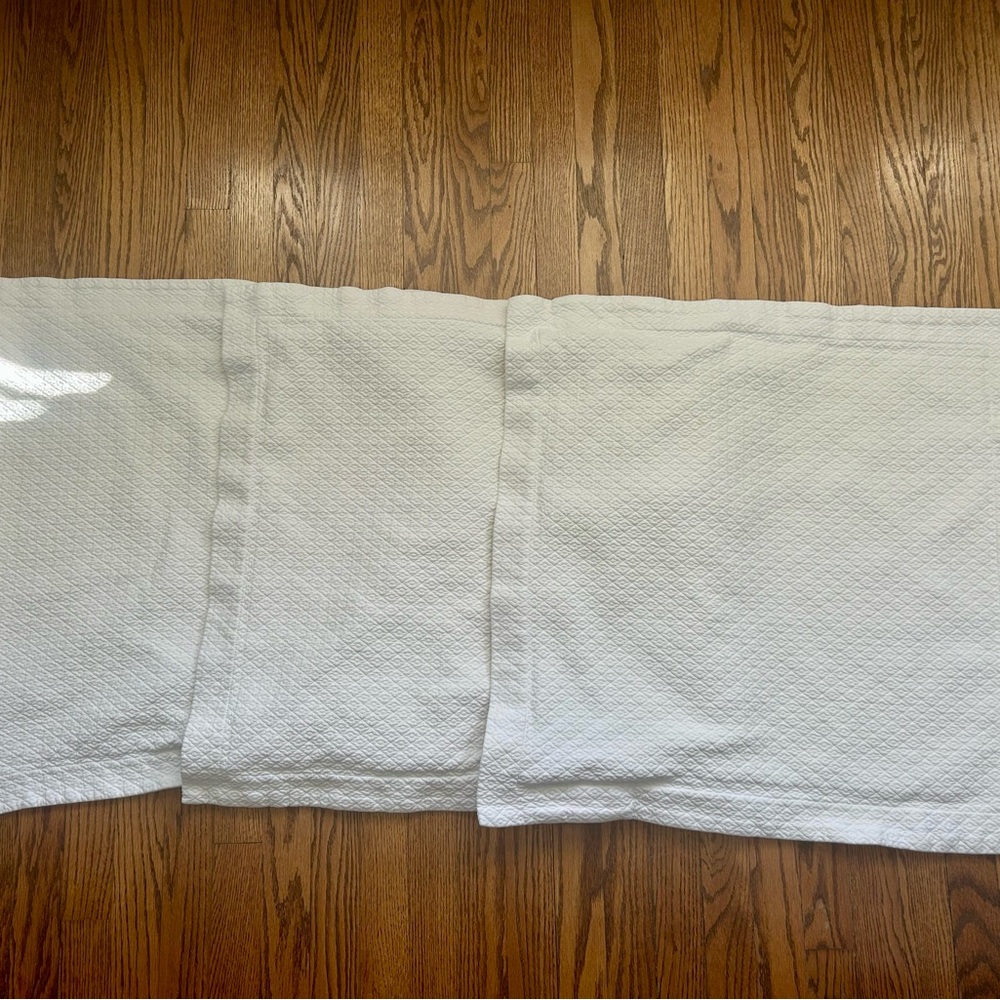 Three (3) white Pottery Barn diamond matelasse Euro shams